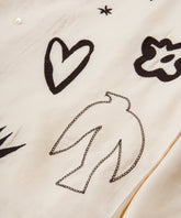 オフホワイト / Mの写真