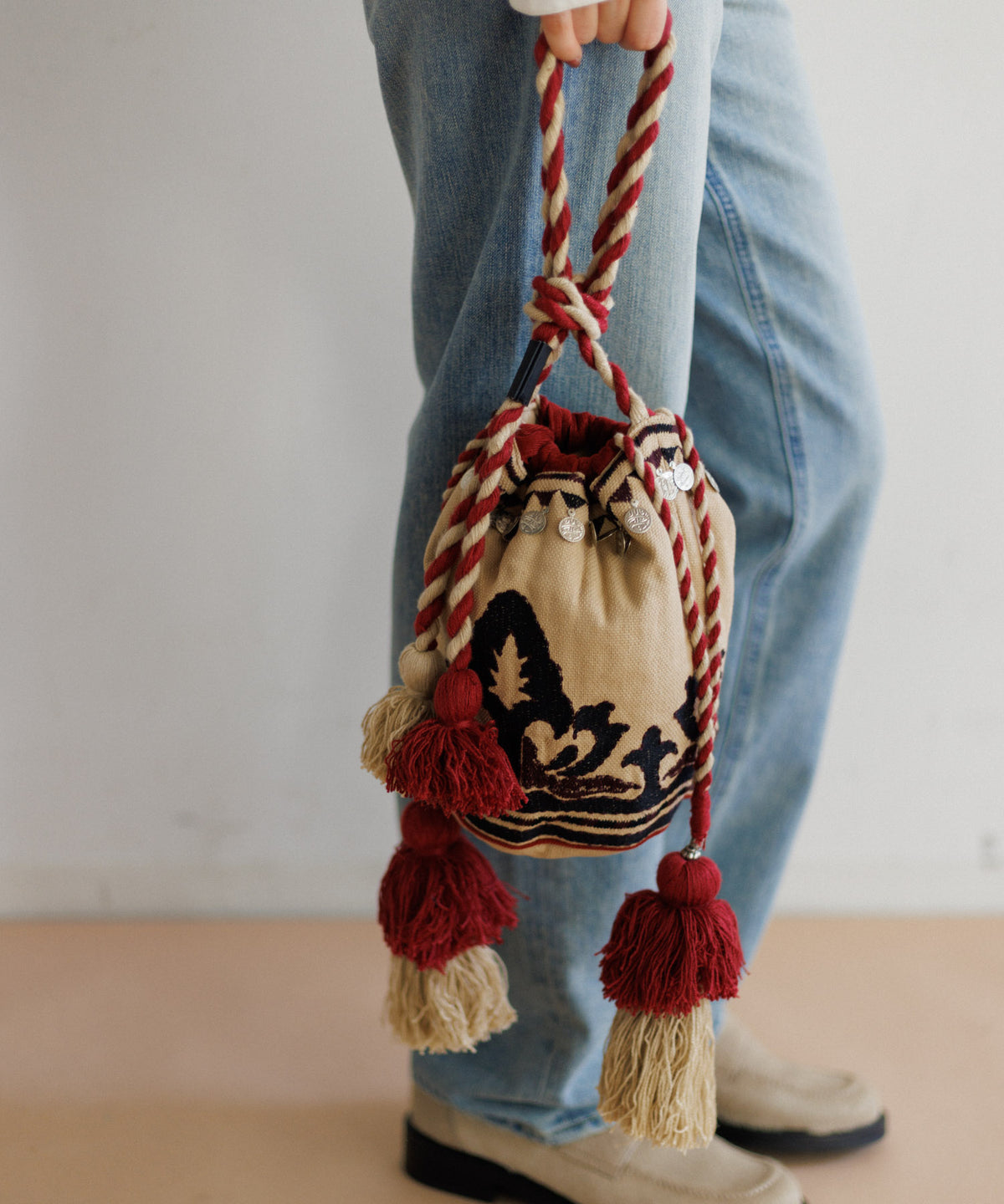【MEN , WOMEN】LEIN マティ幾何学柄刺繍ドロストバッグ