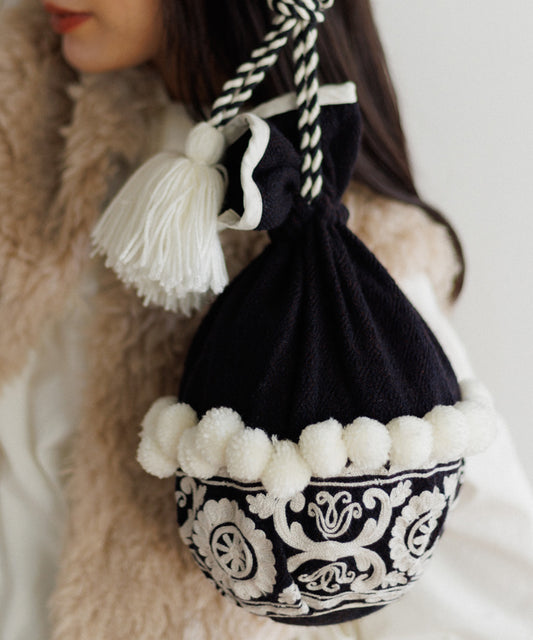 【WOMEN】LEIN 幾何学柄刺繍ドロストバッグの写真